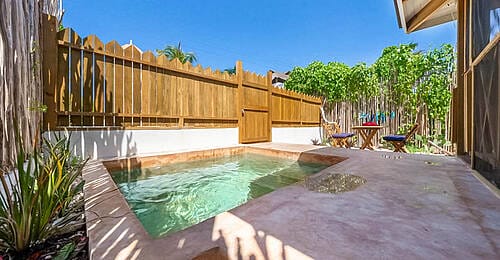 A super cool tiny house with a dipping pool